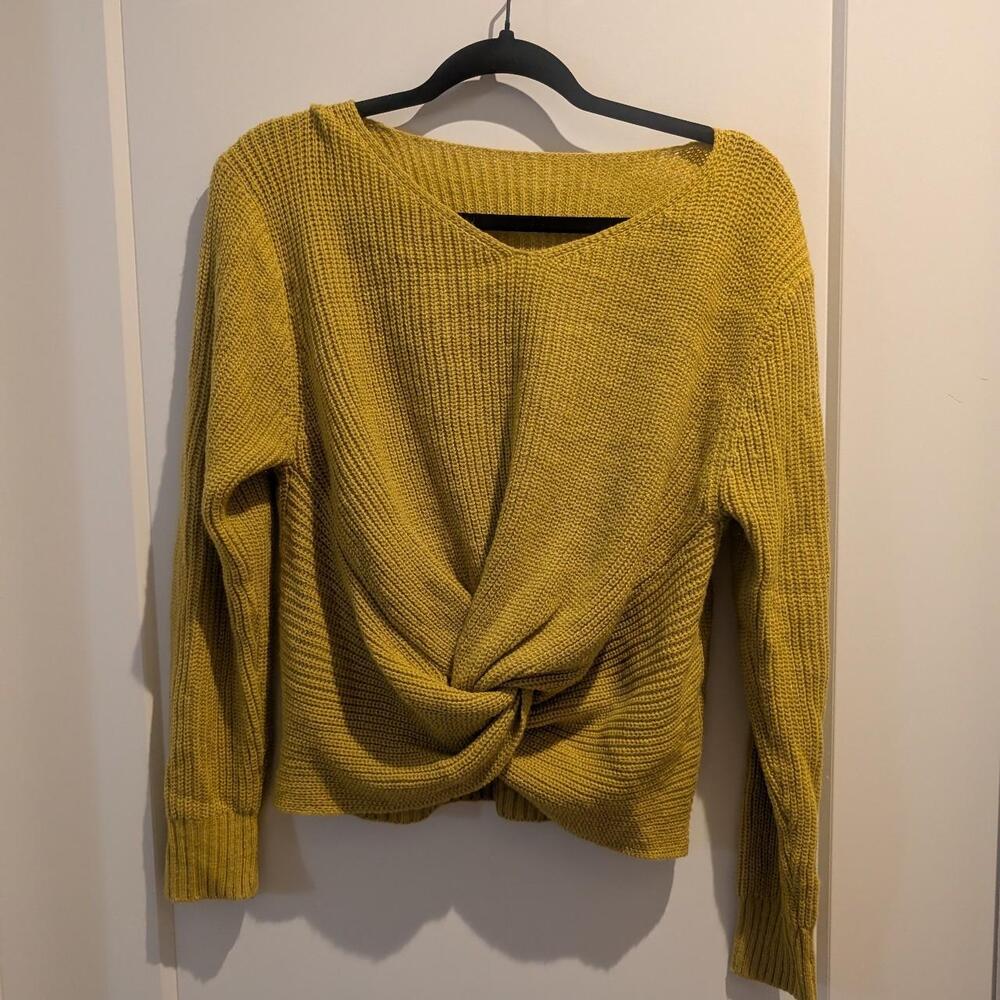 Mustard yellow knitted sweater with twist detail #knitwear #yellow